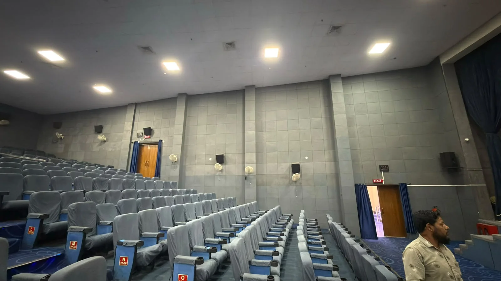 Carpet installation work in auditorium