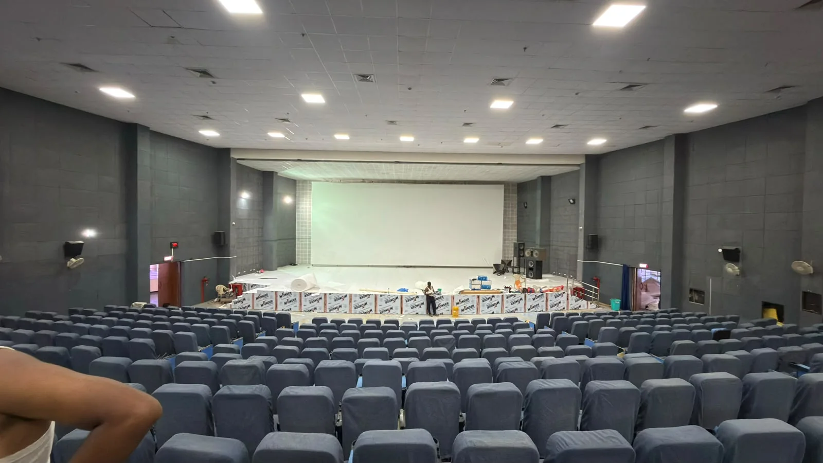Completed auditorium interior with carpet and seating